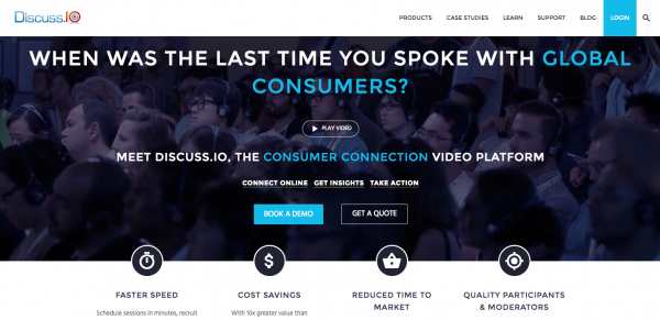 Discuss.io homepage featuring a crowd of people with text: "When was the last time you spoke with global consumers?" Options to book a demo or get a quote are visible.