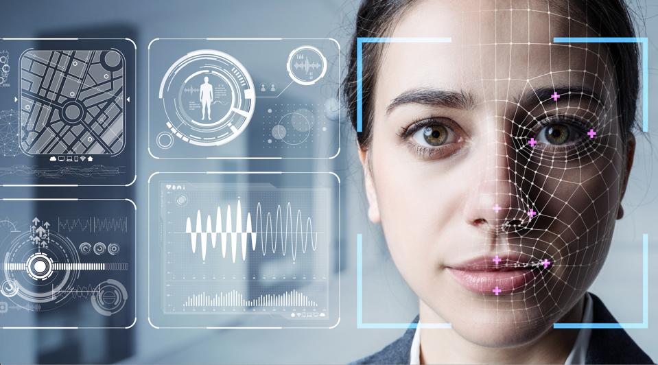 A woman’s face is scanned with digital facial recognition technology; data and biometric analysis graphics are overlaid beside her.